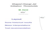 M. Held- Shaped Charge Jet Initiation Thresholds