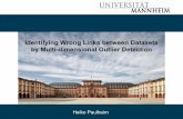 Identifying Wrong Links between Datasets by Multi-dimensional Outlier Detection