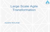 Large Scale Agile Transformation by Husni Roukbi
