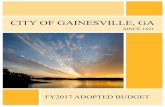 CITY OF GAINESVILLE, GA...ville. One bearing down on the town from Dawsonville Highway and the oth-er from Atlanta Highway, the tornados converged just west of the city and ripped